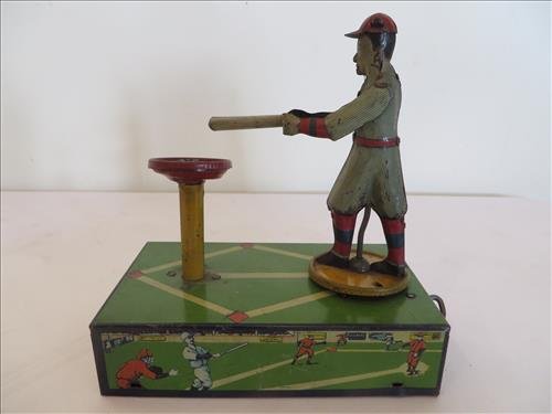 Tin wind up Home Run King toy: Tin wind up Home Run King toy made by SelRite Products, 114 E. 16th St. New York, NY, working condition, minor overall wear and few minor scratches, 3 1/2" x 6 1/4" x 7"t., $85-150