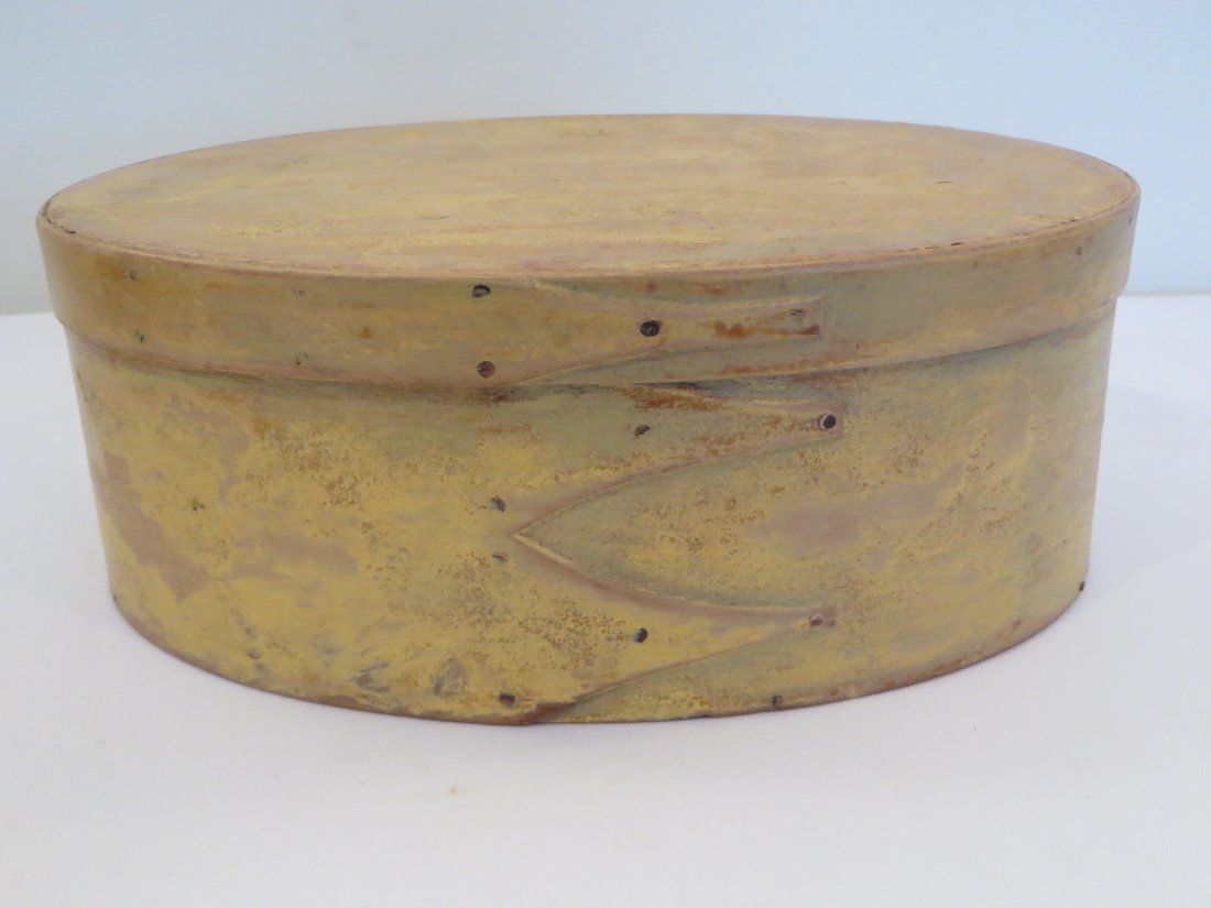 Oval Shaker 2 fingered pantry box: Oval Shaker 2 fingered pantry box in newer yellow paint, otherwise good condition, 9" x 6" x 3 1/2"t. $50-100
