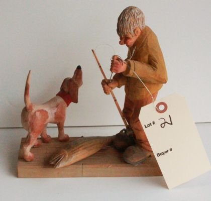 21. Vintage wood carving of fishermen. Signed a Moser: Measures 9 inches tall.