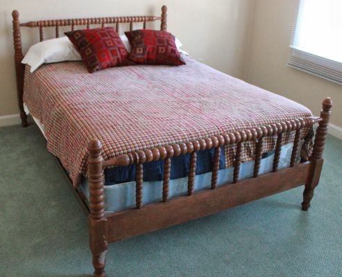 45. Antique Jenny Lind double size bed.: Together with rails and slats.