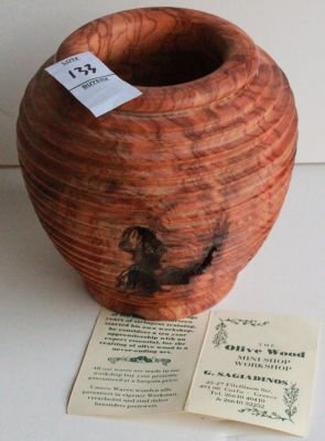 133. Olive wood machine turned vase burl wood.: Measures 6 inches tall.
