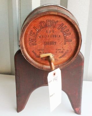 154. Antique Melody Hill Sherry wine barrel on stand.: Measures 14 inches tall together with stand.