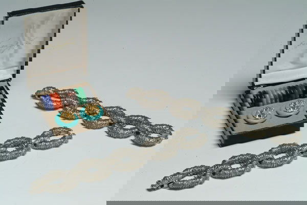 Fashion Kenneth Jay Lane Bracelets a: Kenneth Jay Lane Bracelets and Earrings hammered silver tone oversized link bracelets together with lion head earrings with changing bezels [3], l. 3" - 7.5 cm., c. 1960 See illustration Est. $80/120