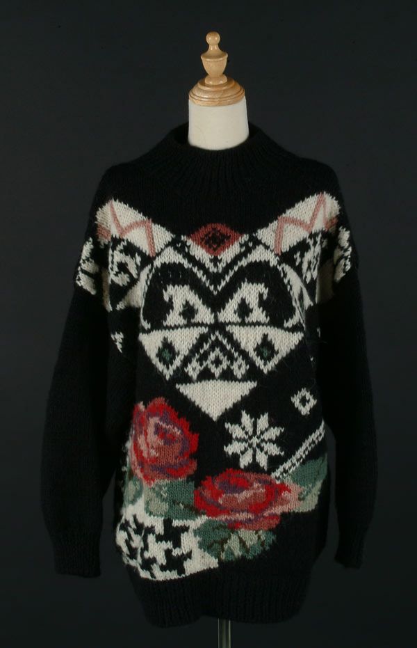 Fashion Two Chunky Byblos Sweaters: Two Chunky Byblos Sweaters mustard wool knit with paisley design (S) together with a black floral design (L), labelled Byblos; size 40/42 See illustration Est. $50/75