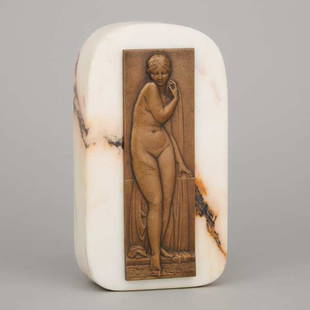 Pierre Turin (French, 1891–1968): Lot 343 Pierre Turin (French, 1891–1968) VENUS AT THE BATH bronze relief plaque with incised signature, on marble block stand height 8.1" — 20.7 cm. Estimate $100-$150