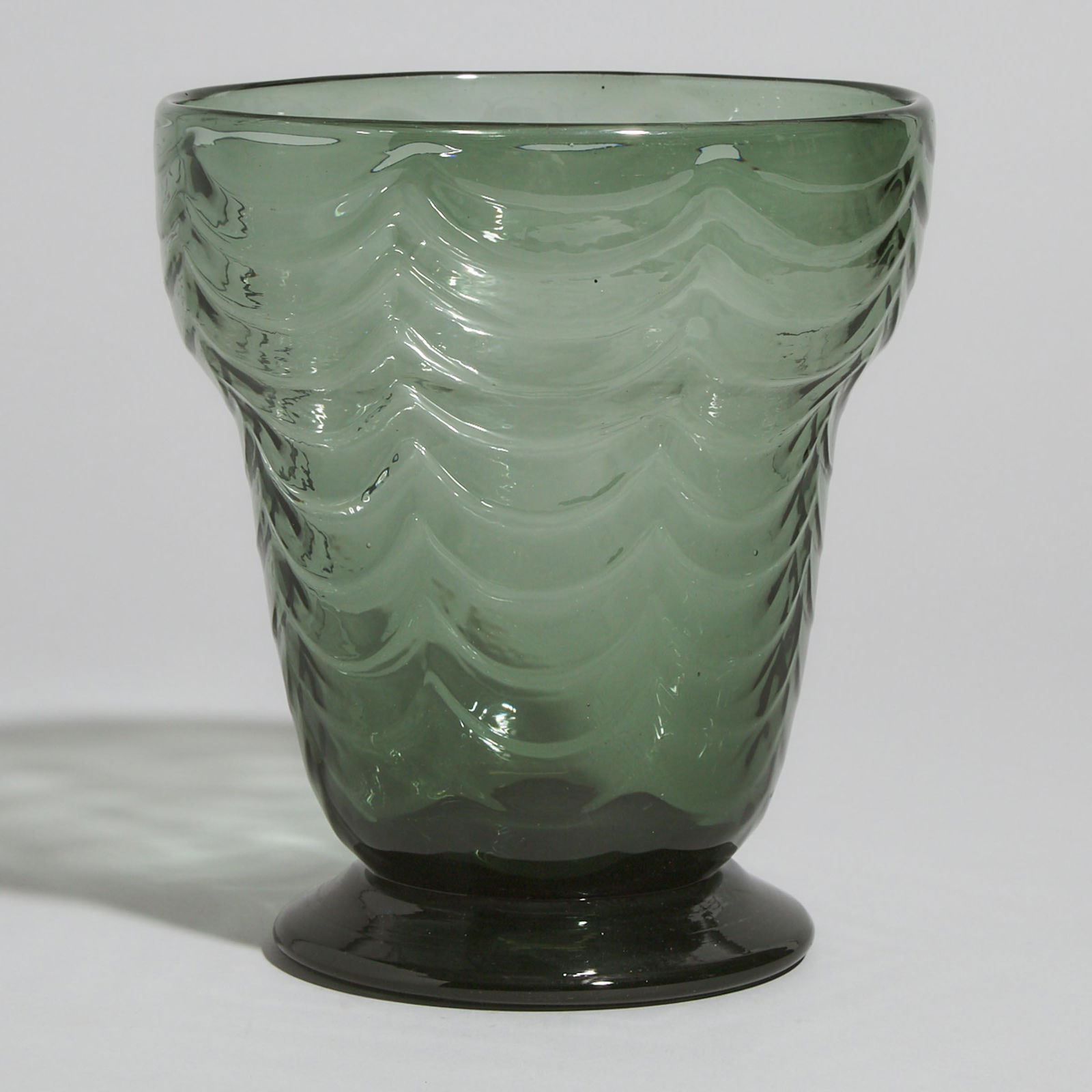Stevens & Williams Brierley Moulded Green Glass Vase,: Stevens & Williams Brierley Moulded Green Glass Vase, Keith Murray, 1930sheight 8.1 in — 20.5 cm, diameter 7.3 in — 18.6 cm, etched Keith Murray signature, SW with fleur-de-lis and BRIERLE