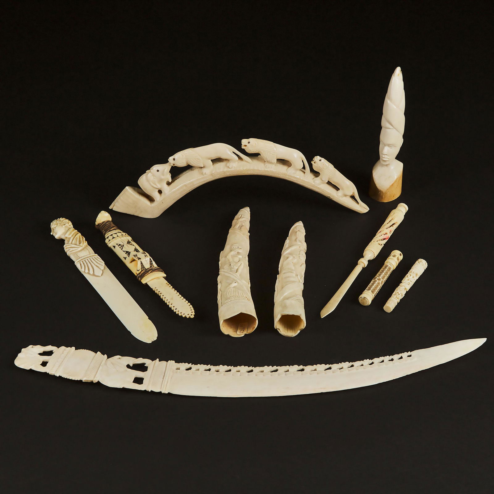 A Group of Ten Ivory and Bone Needle Cases, Letter: A Group of Ten Ivory and Bone Needle Cases, Letter Openers, and Tusk Carvings, Mid 20th Century二十世纪中期 牙骨雕一组十件