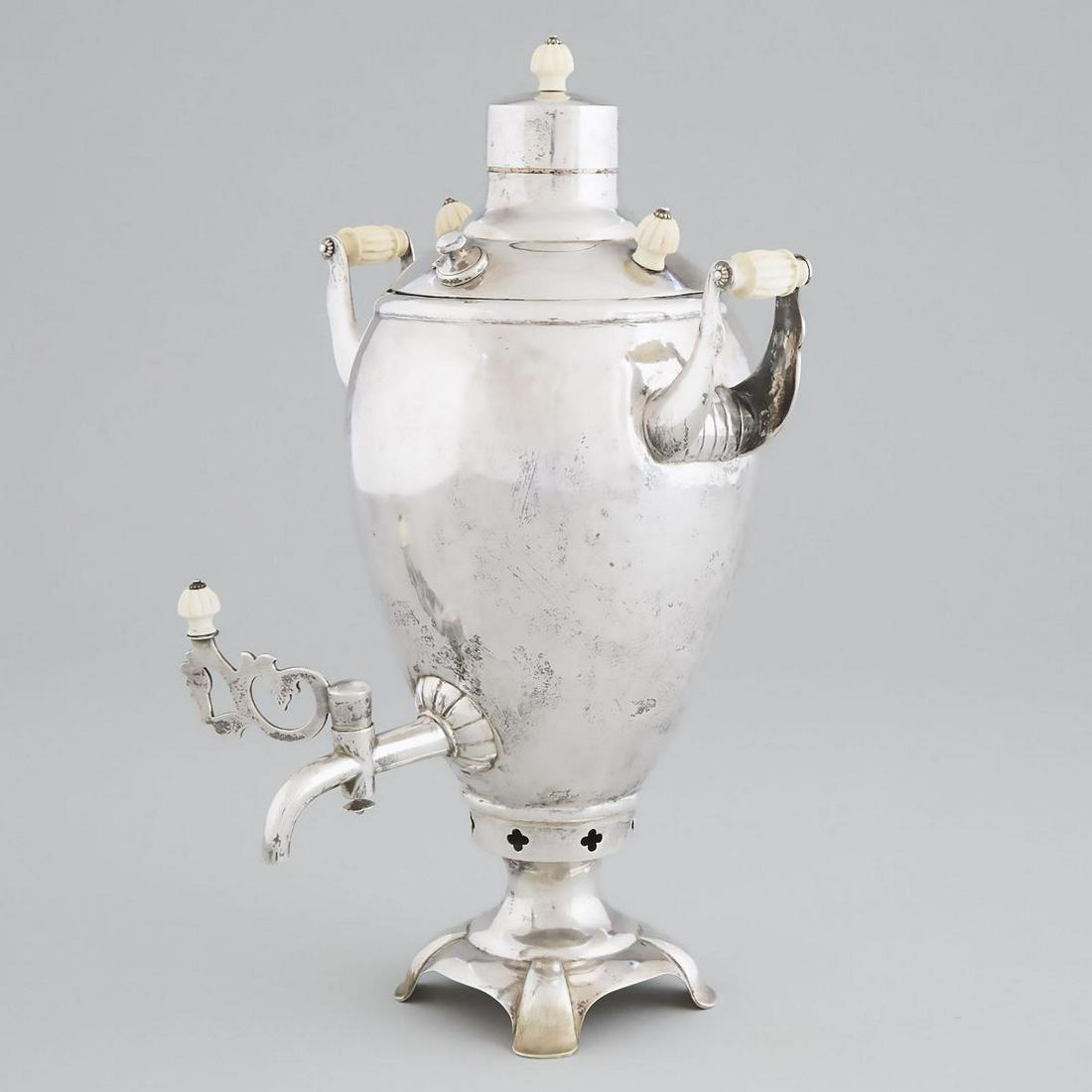 Russian Silver Samovar, probably Alexei Nasyedin for: Russian Silver Samovar, probably Alexei Nasyedin for Grachev, St. Petersburg, 1889height 14.5 in — 36.8 cm, 53.6 oz. — 1667 grams, assaymaster's mark (cyrillic) AFNote:Contains material wh