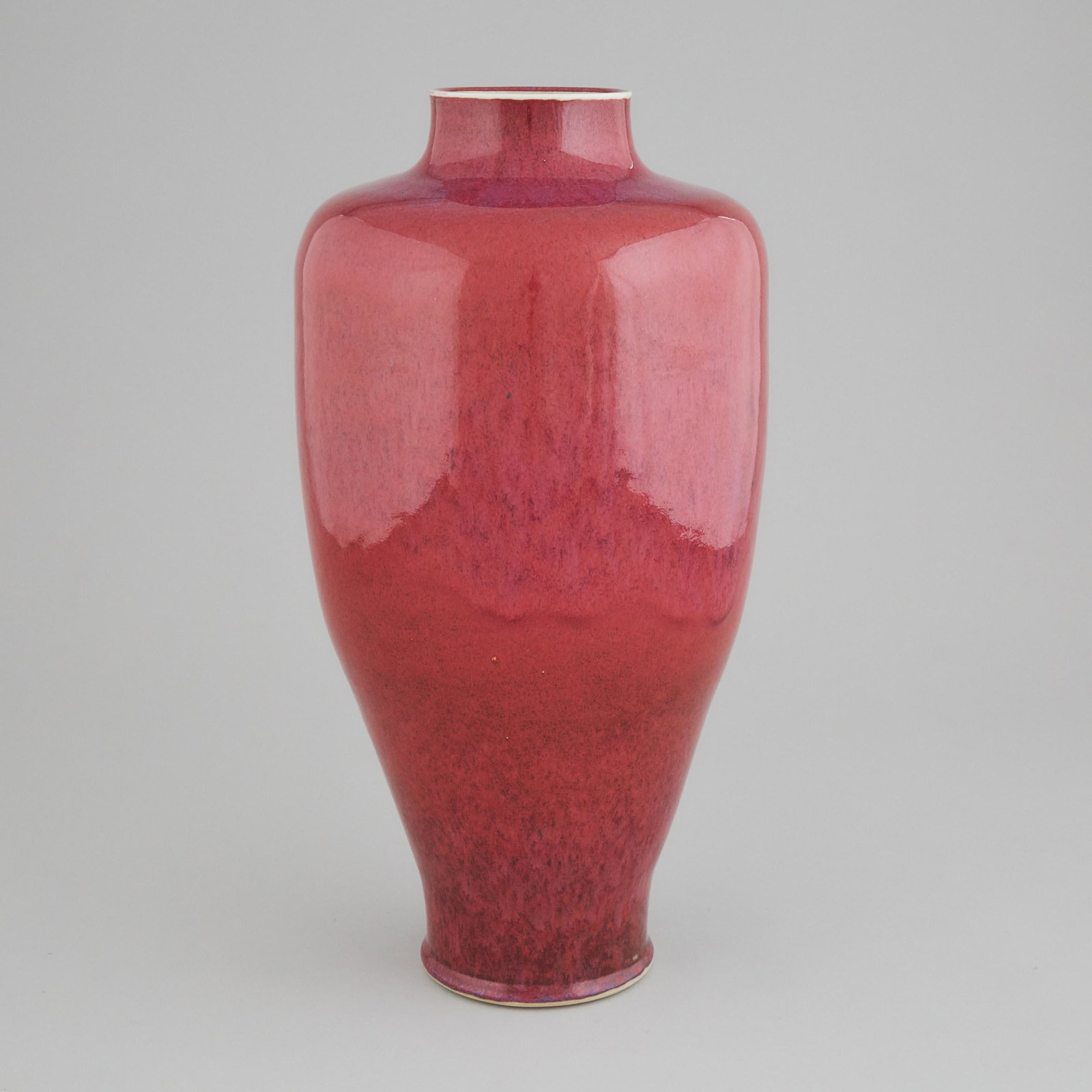 Brother Thomas Bezanson (Canadian/American, 1929-2007), Oxb: Brother Thomas Bezanson (Canadian/American, 1929-2007), Oxblood Glazed Vase, c.1985-90height 18 in — 45.6 cm, incised cipher markEstimate: $1,000—1,500