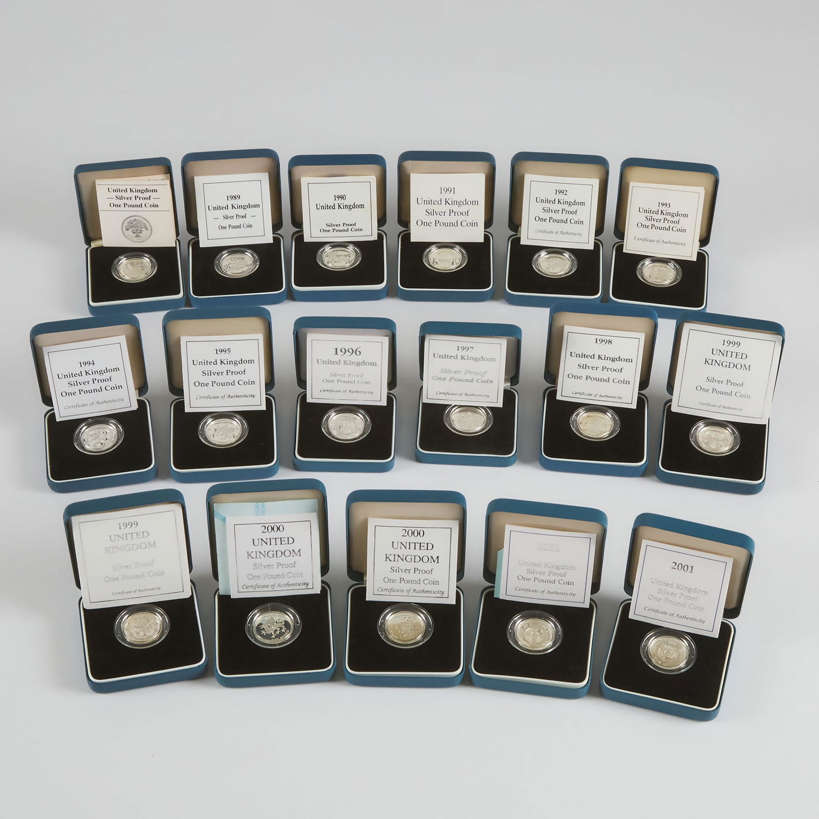 17 x British Sterling Silver Proof One Pound Coins, in case: 17 X BRITISH STERLING SILVER PROOF ONE POUND COINSin cases, assorted yearsEstimate: $140—180