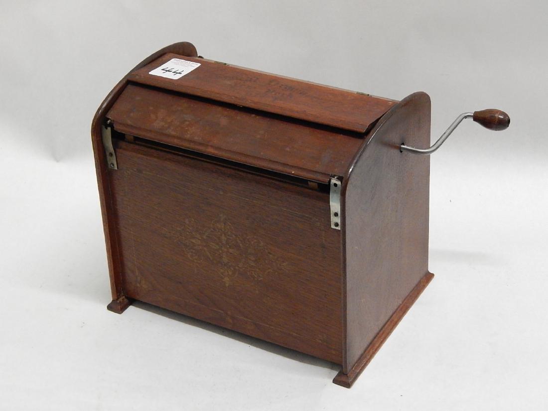 Antique Mahogany Case Roller Organ: Antique mahogany case hand crank roller organ. Unknown maker, needs repair. Measures 14" wide including handle
