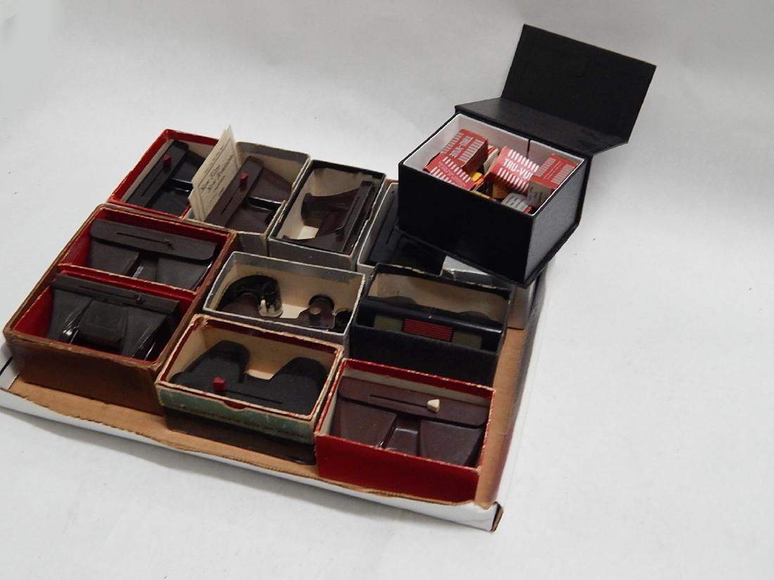 Box of Tru-Vue 3-D Viewers: Collection of 12 various art deco Tru-Vue viewers and box of film slides