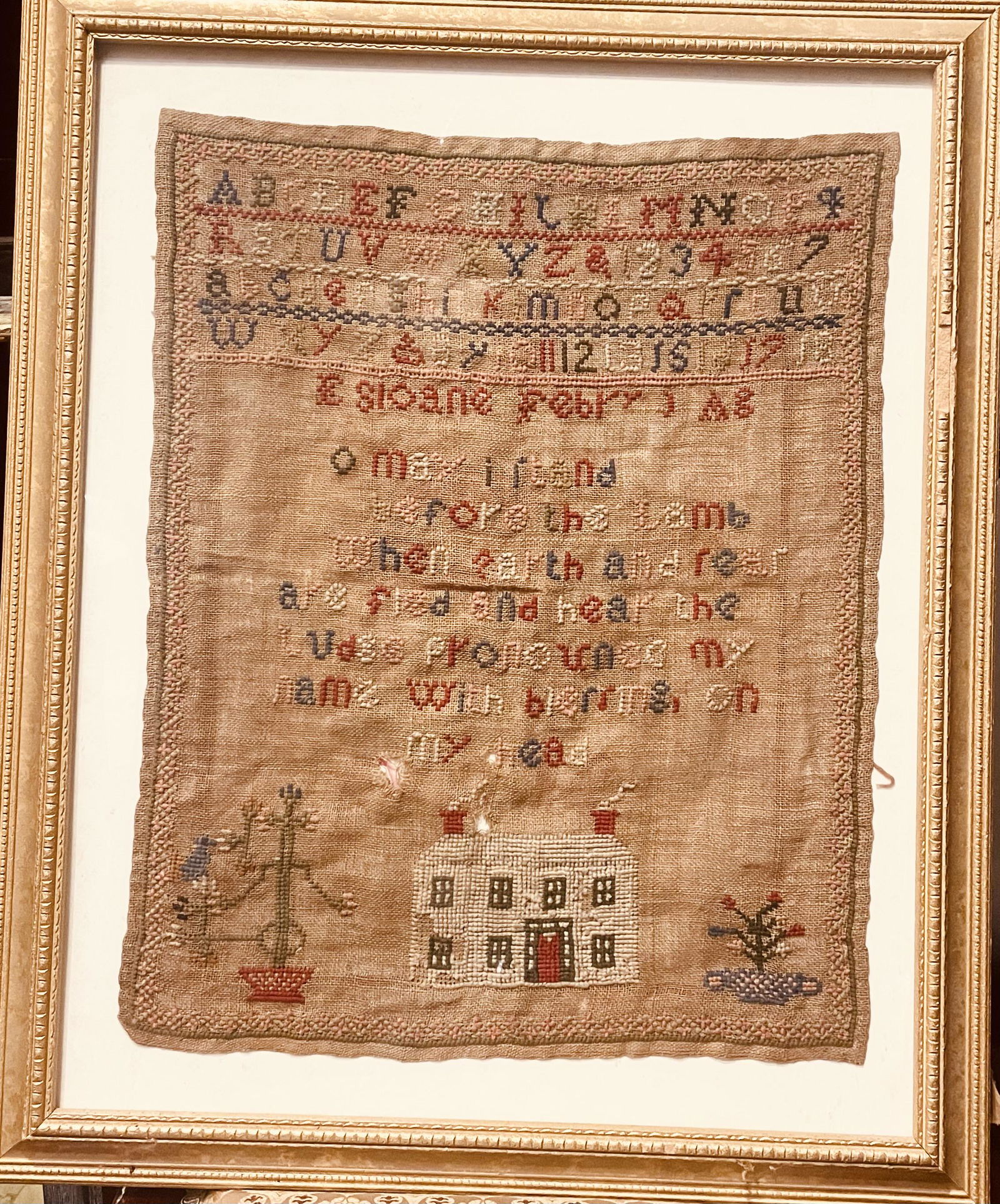 Needlework sampler: Early 19th century American sampler. E.Sloane. Date indistinct. â€œO may I land before the lamb when the earth...” Dimensions: 17” x 13”