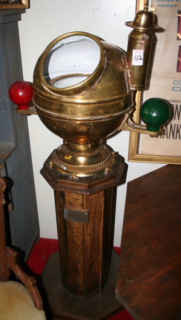Ships Binnacle: Brass and wood 42” High x 20” at base.