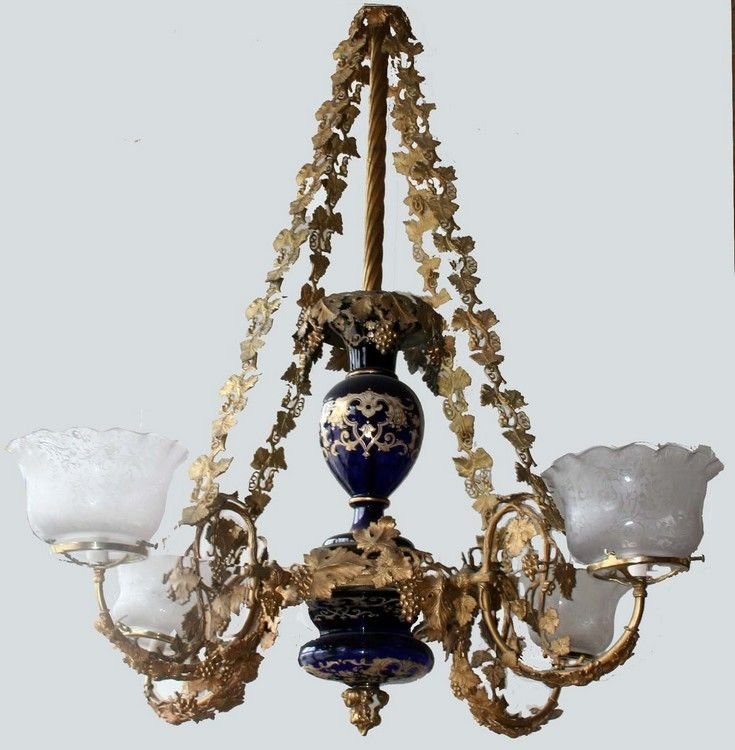 1850’s Archer & Warner Gasolier: 39" Long x 36" Across … Fantastic early light fixture, 1851-1855, All the chains are cast with the name: Archer and Warner. Hand gilt Boston and Sandwich blue glass central bodies. One small chip on