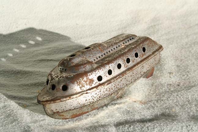 Metal Ferry Boat " Kalakala": Super-rare Pacific Northwest tub toy. Powered by chemical reaction. 5.5” Long x 2” High. Worn original finish.