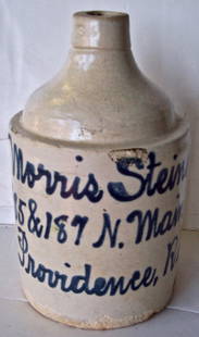 19 C -MORRIS STEINER PROVIDENCE, RI -STONEWARE JUG: 19 C -MORRIS STEINER 185 TO 187 N. MAIN ST. PROVIDENCE, RI -STONEWARE JUG - 9.5" TALL