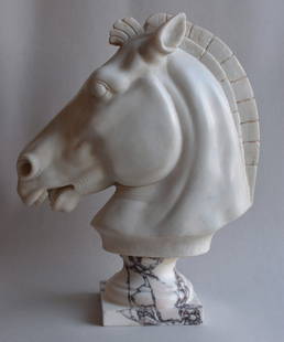 CLASSIC HORSE HEAD: Horse head carved on white Carrara marble placed on a turned base in "breccia medicea" marble. Finely crafted in a classical style, inspired by the sculptures of Phidias on the Parthenon. Dimensions: