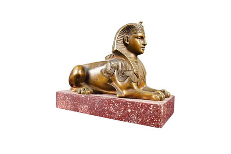 BRONZE SPHINX: Bronze Sphinx with Red Porphyry base, 20th century. Dimensions: 13x15x7cm. Good condition - used with small signs of aging & blemishes. YOU CAN REQUEST FURTHER PHOTOS BY EMAIL.TO KNOW THE EXACT