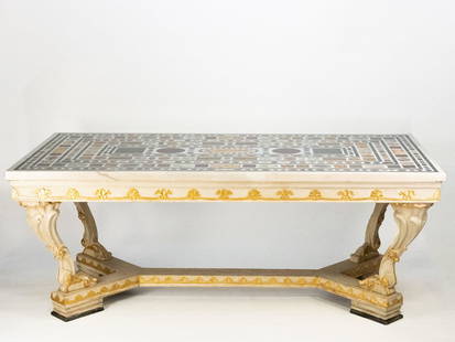 Large table: Table with rectangular top in white marble entirely inlaid with samples of semiprecious stones and polychrome marbles; base in white and gilded lacquered wood with four volute supports joined by