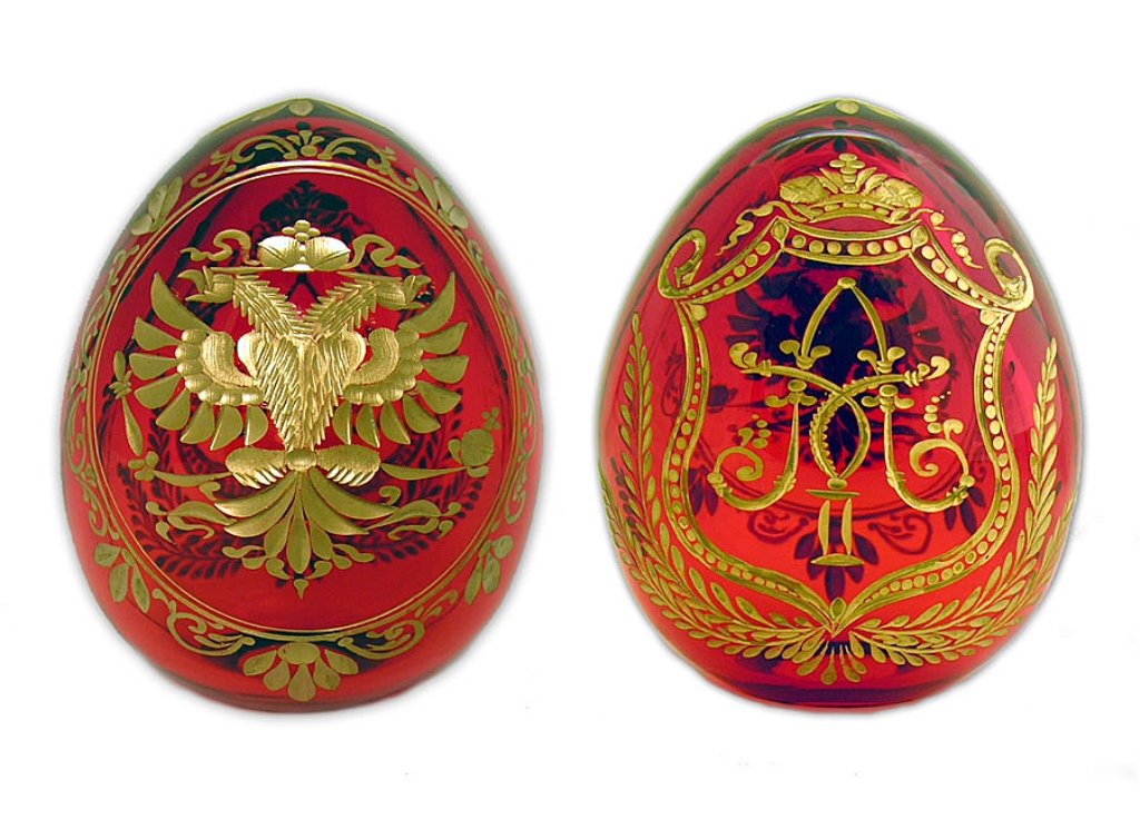 Imperial Crystal Russian Romanov Crest Egg: Imperial Crystal Russian Romanov Crest Egg. The Double Headed Eagle, the symbol and crest of the Romanov Dynasty, has two heads - one faces East and the other West. This egg was hand-blown and engrave