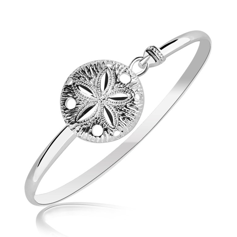 Sterling Silver Sand Dollar Bangle Bracelet: Features a diamond cut sand dollar design on a thin bangle. Crafted in sterling silver measures 7''