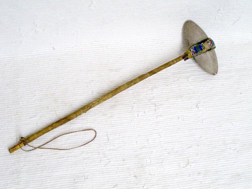 Native American Indian Stone Warrior Tomahawk: Native American Indian Stone Warrior Tomahawk, measures 21" L. This is an old war club, most likely Plains Indian. The beading is broken in some places due to age.