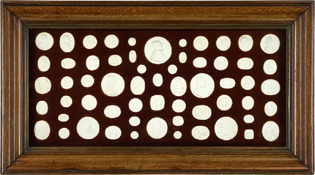 A Framed Collection of Grand Tour Plaster Cameos. (1 of 7)