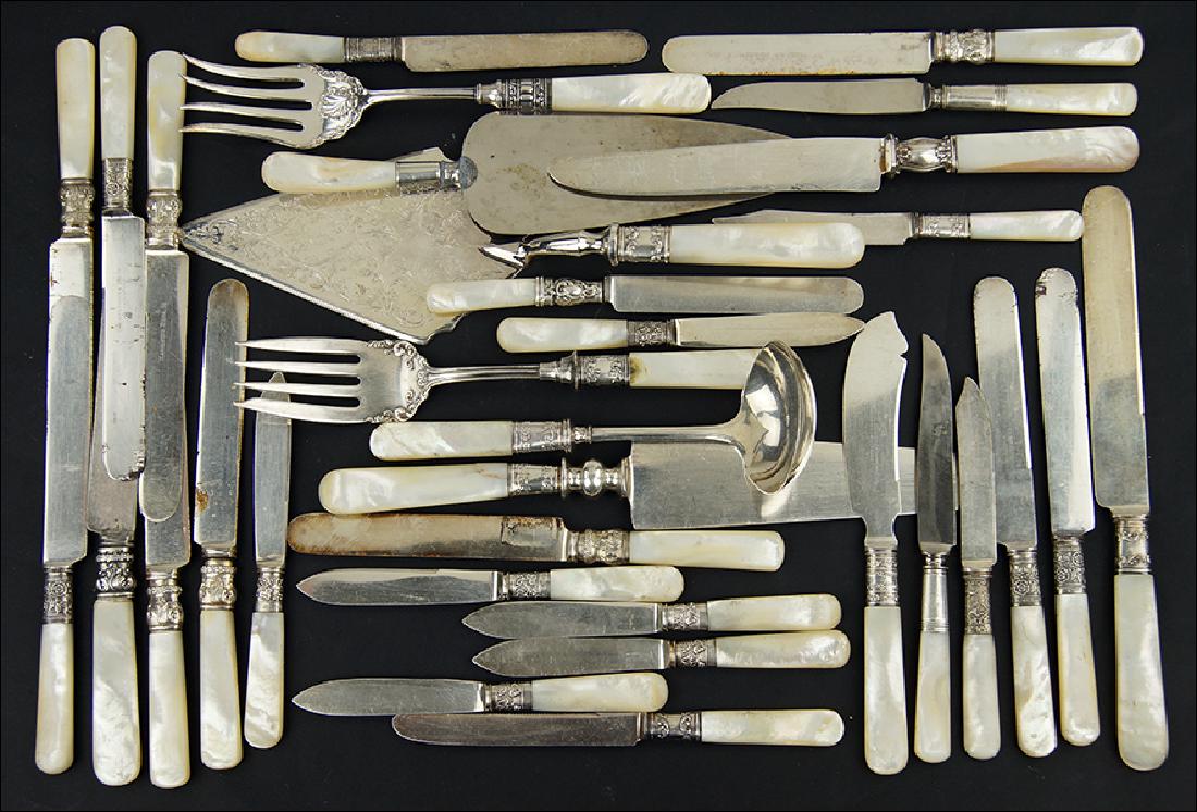 A Collection of Mother-Of-Pearl Handled Flatware. (1 of 1)