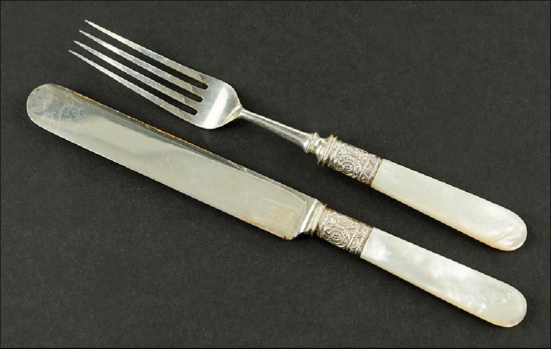 A Mother-Of-Pearl Handled Dessert Set. (1 of 1)