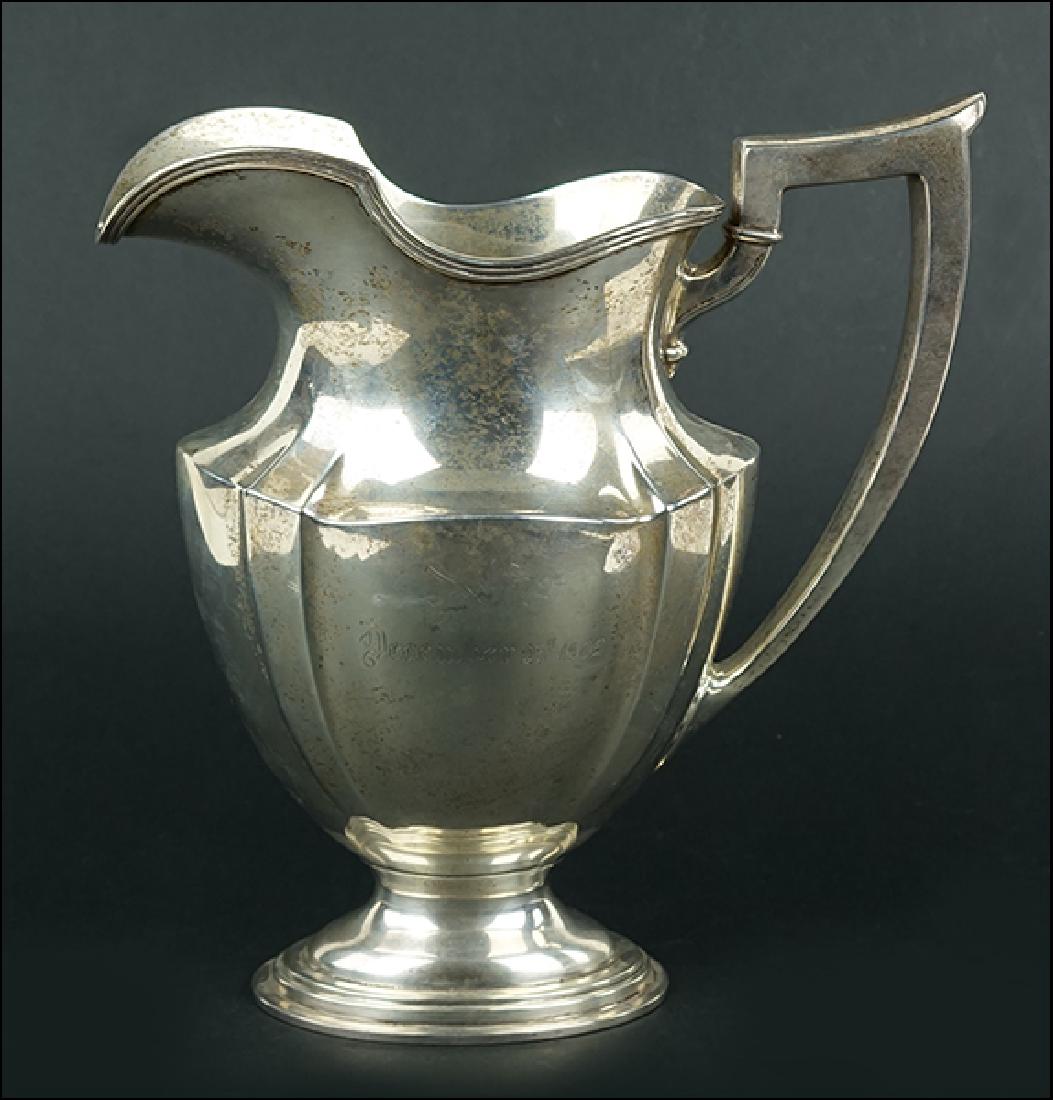 A Gorham Sterling Silver Water Pitcher. (1 of 1)