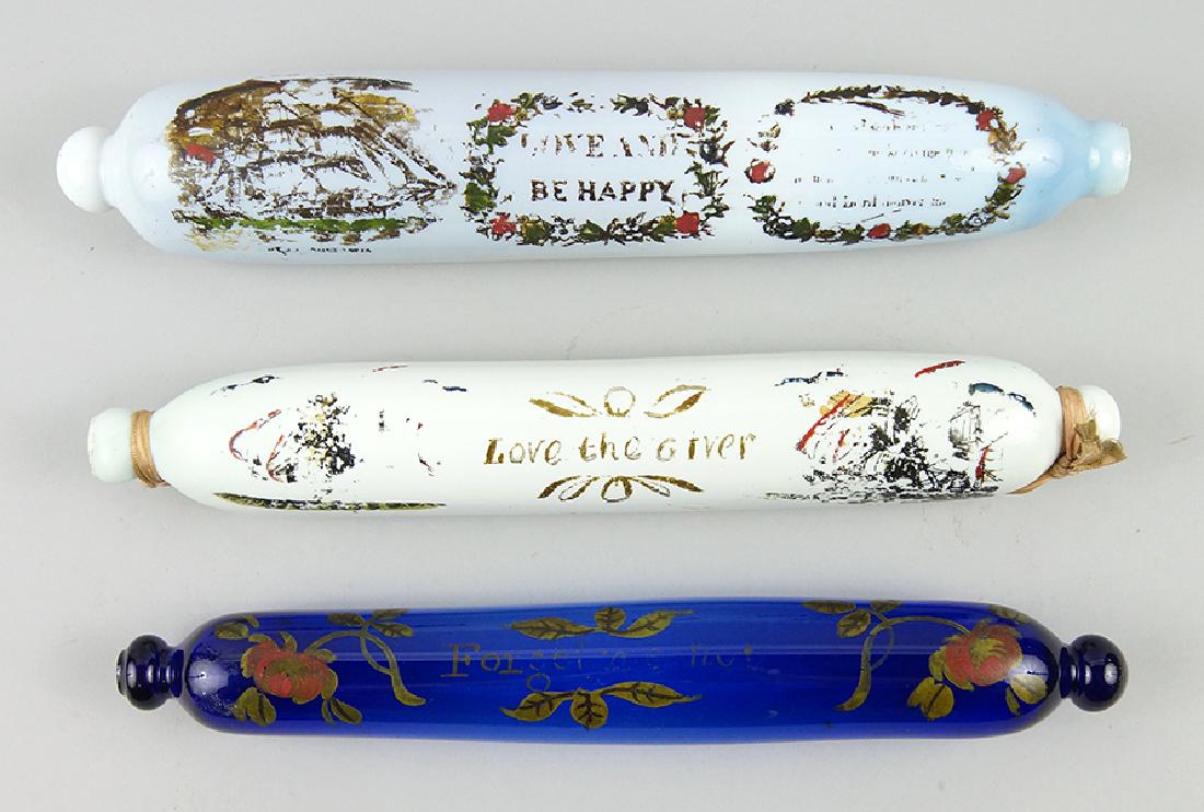 Three Glass Rolling Pins.: Three Glass Rolling Pins. All with painted decoration. Provenance: Marshall Field & Co Longest: 16"