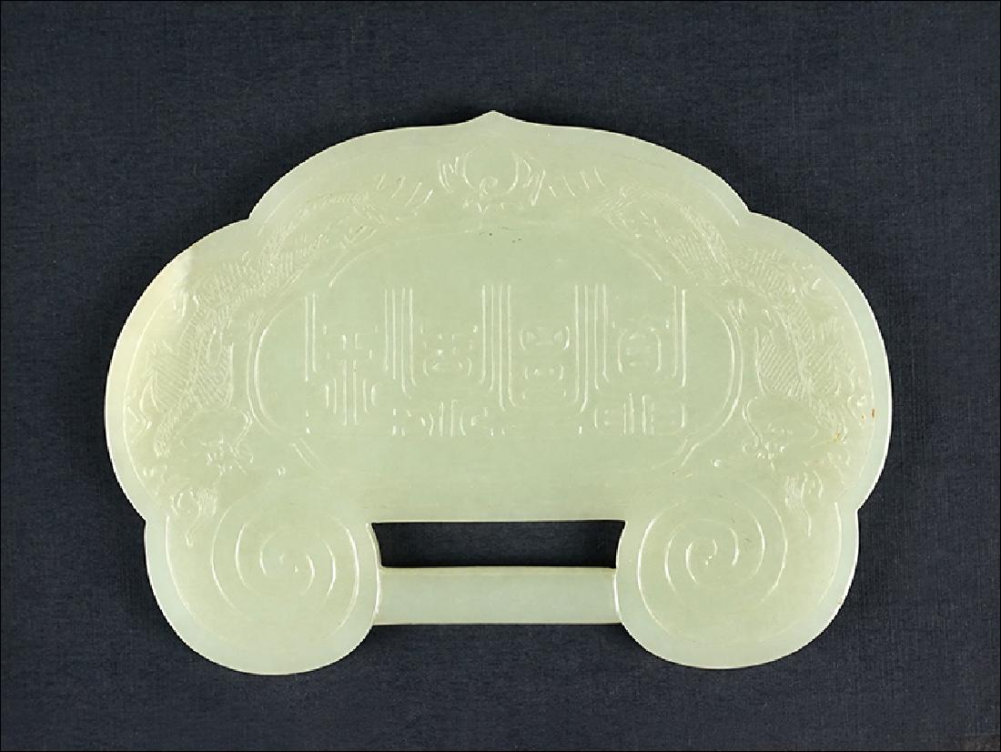 A Chinese Incised Jade Lock-Shaped Plaque. (1 of 5)