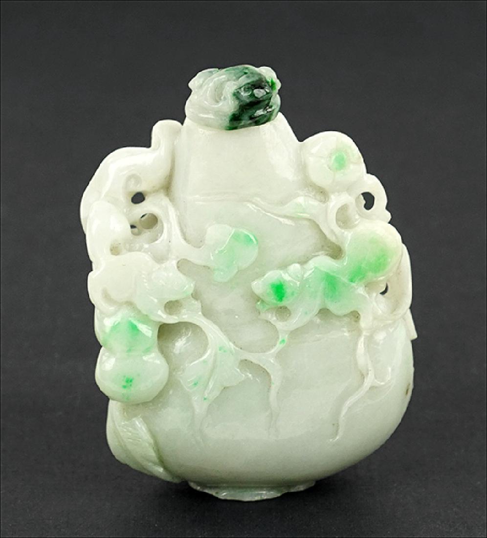 A Carved Jade Double Gourd Form Snuff Bottle. (1 of 1)