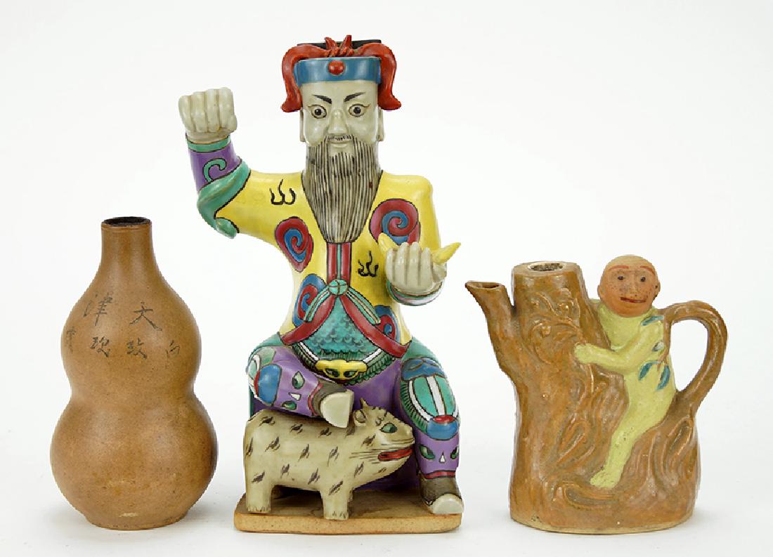 A Chinese Glazed Ceramic Monkey Form Teapot. (1 of 10)