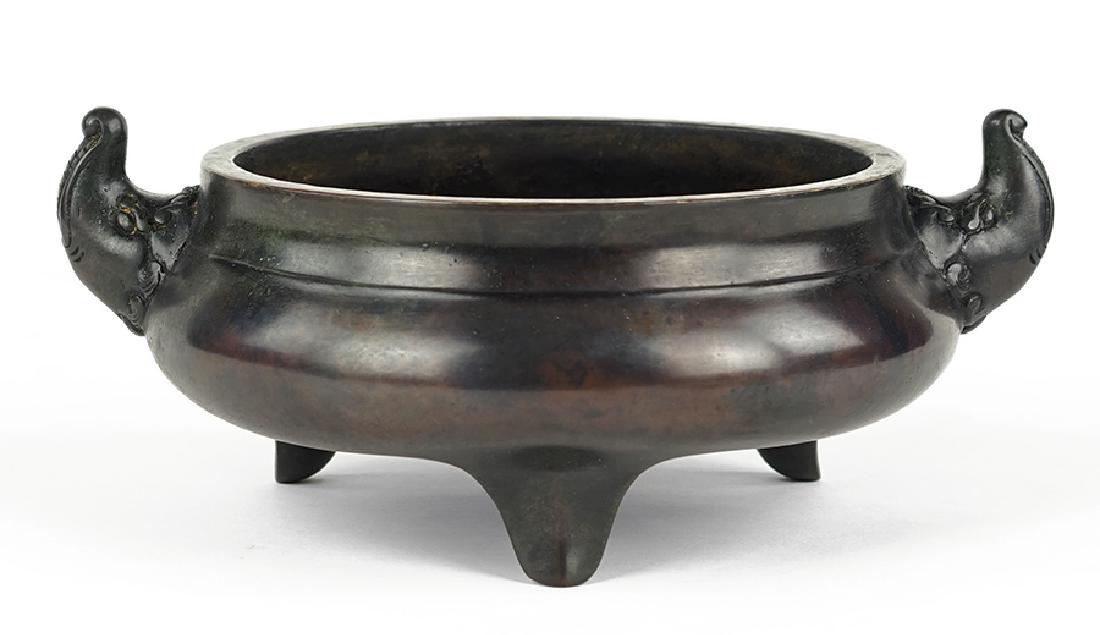 A Chinese Bronze Tripod Form Censer. (1 of 2)