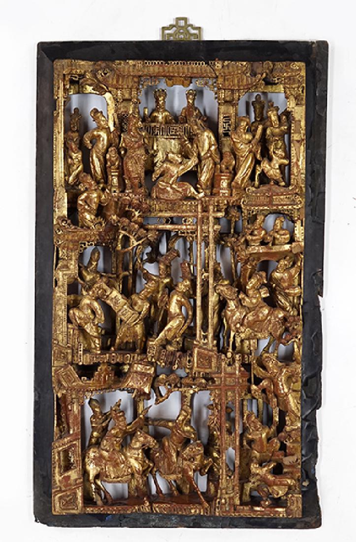 A Chinese Gilt and Red Lacquered High Relief Panel. (1 of 10)