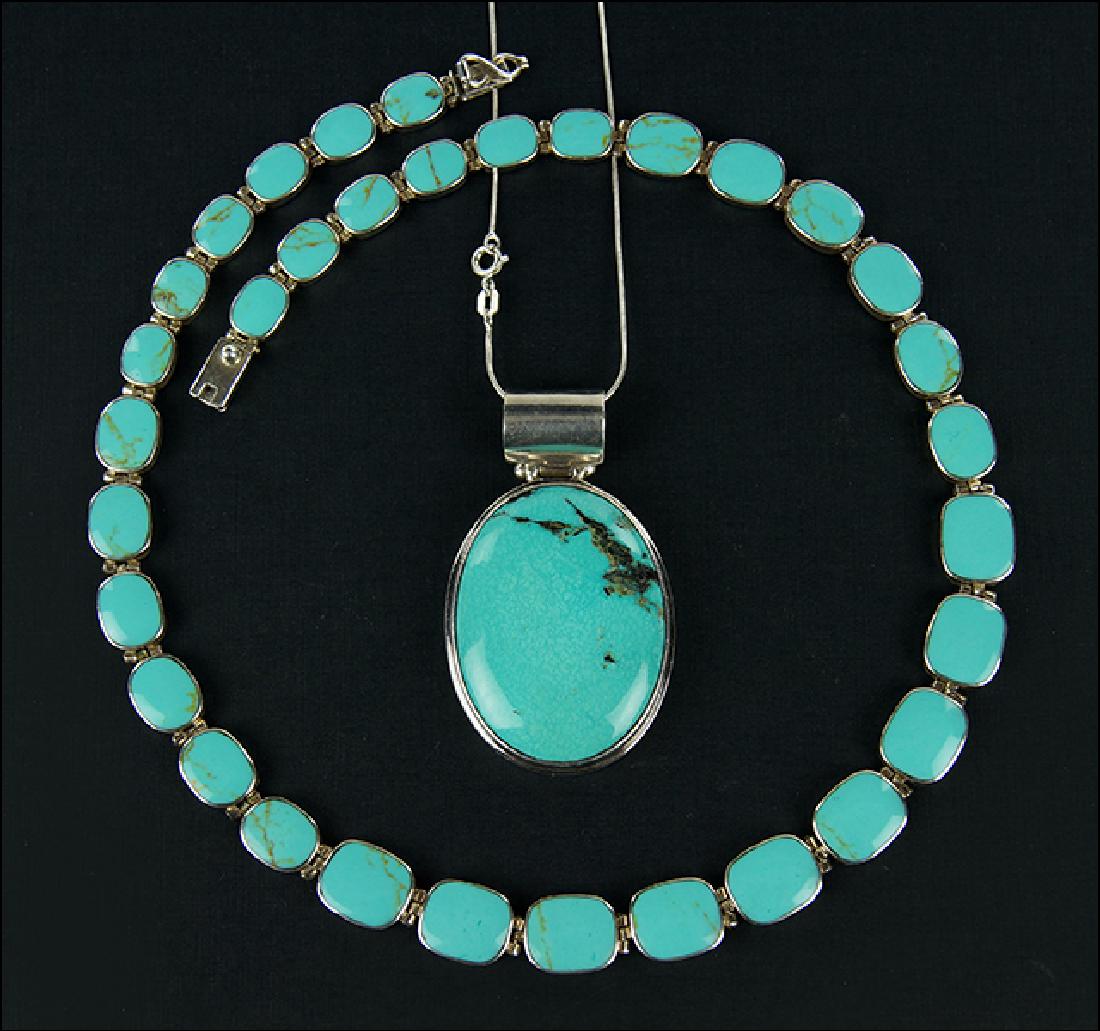 A Graduated Turquoise and Sterling Silver Necklace. (1 of 1)