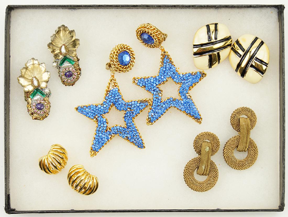 A Pair of St. John Enamel Earclips. (1 of 1)