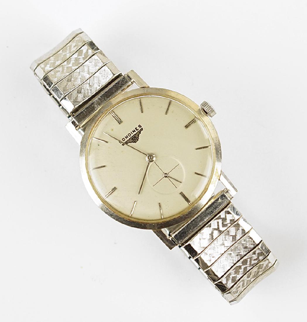 A Man's Longines 14 Karat White Gold Watch.: A Man's Longines 14 Karat White Gold Watch. 17 jewel movement is stamped "3241920". Case is stamped "688771". Susanin's will not comment on the working status of any watch or clock movement Face diame