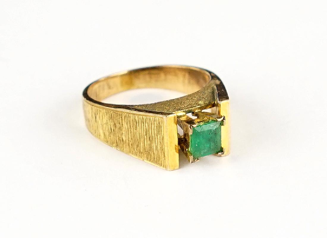 An Emerald and 14 Karat Yellow Gold Ring. (1 of 1)