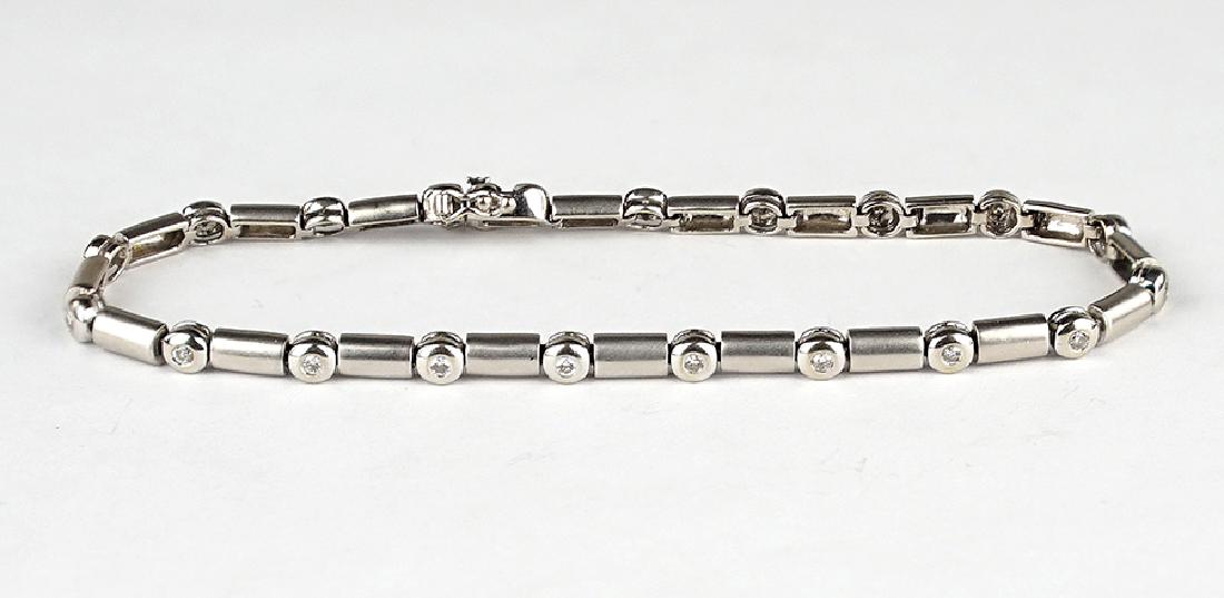 A Diamond and 14 Karat White Gold Line Bracelet.: A Diamond and 14 Karat White Gold Line Bracelet. Alternating links of polished white gold bezel set diamonds and brushed white gold bar links. Diamonds total approximately .50 carat Length: 7.25" Wt: 