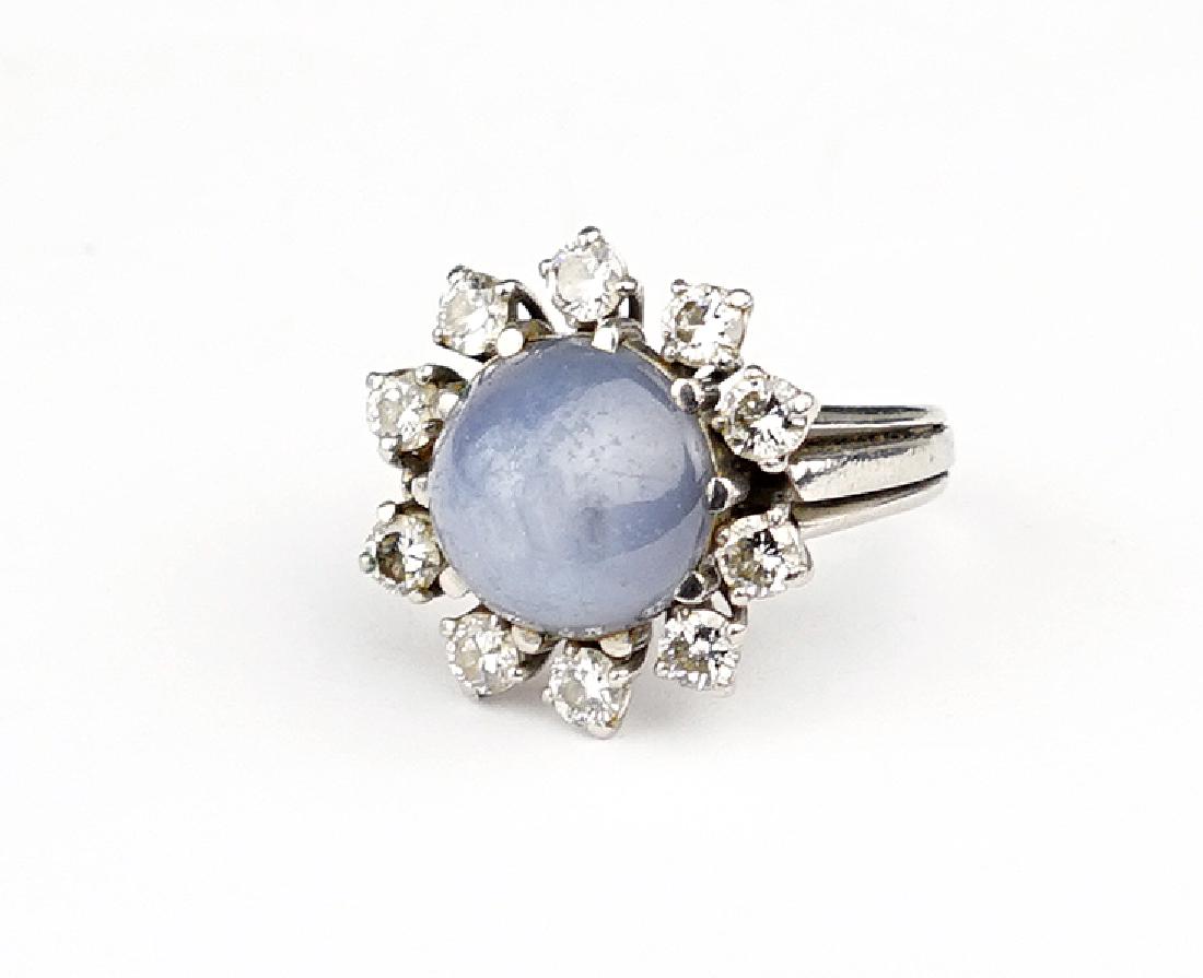 A Star Sapphire and Diamond Ring. (1 of 1)