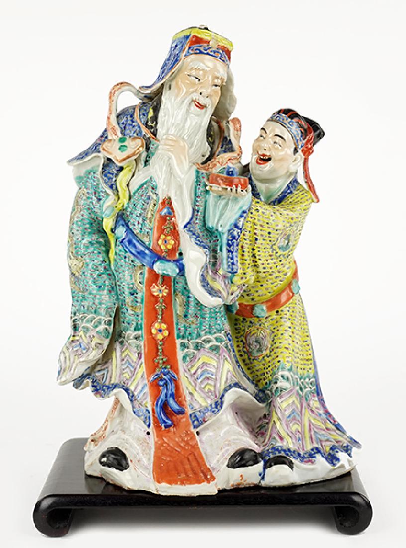 A Chinese Porcelain Figural Group. (1 of 1)