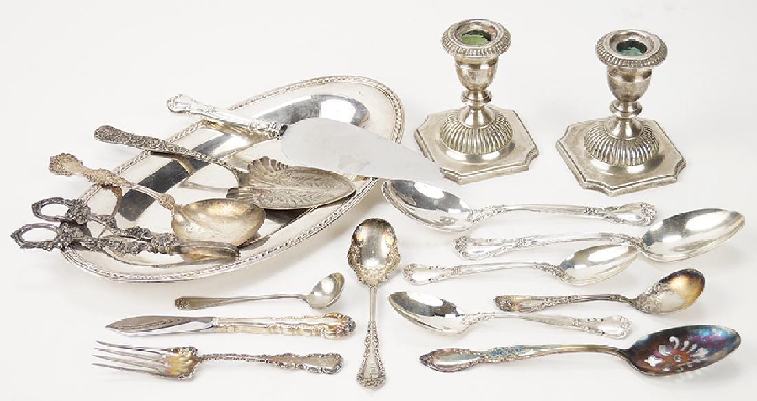 A Pair of Weighted Sterling Silver Low Candlesticks. (1 of 1)