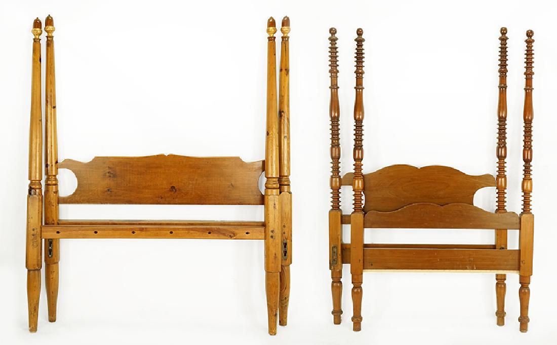 A Turned Walnut Bed Frame.: A Turned Walnut Bed Frame. Together with a walnut bed frame. Both sets comprise a headboard, footboard, and two side rails Larger headboard: 72" x 56" Smaller headboard: 71" x 41"