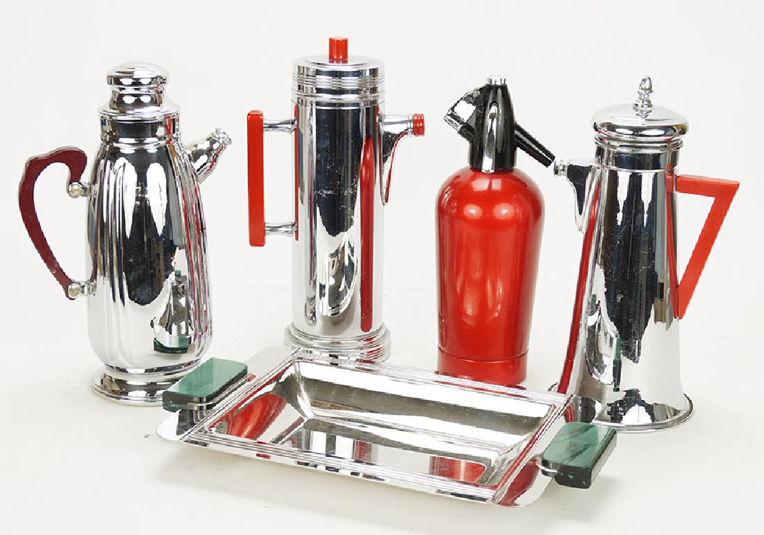 Group of Barware.: Group of Barware. Consisting of three stainless chrome shakers with bakelite handles, two have red bakelite and one has cherry juice bakelite. Together with a red spritzer and a two handle tray Shaker