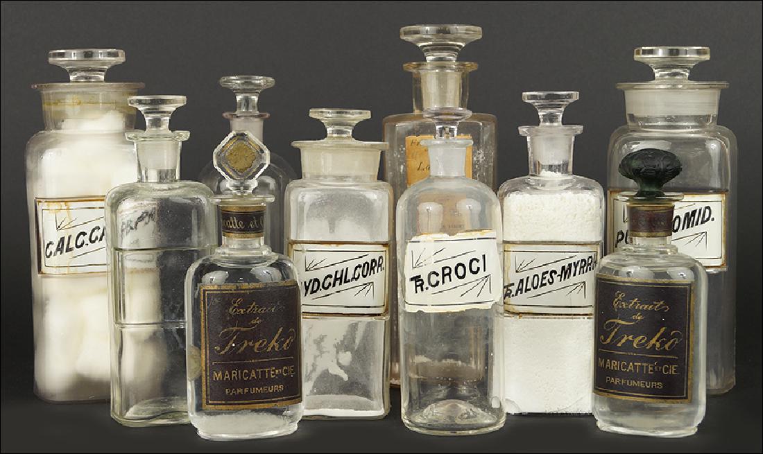 Collection of Apothecary Jars and Bottles.: Collection of Apothecary Jars and Bottles. Consisting of ten jars and bottles, several have the lids glued and several have the porcelain names on the jars