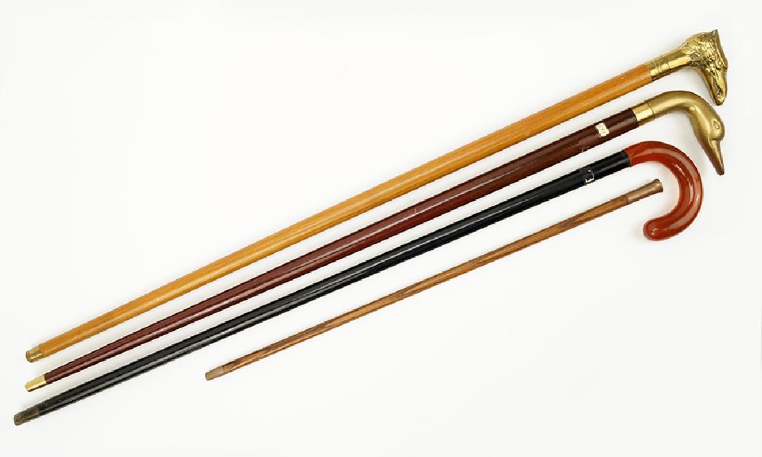 Group of Brass and Bakelite Handle Canes. (1 of 2)