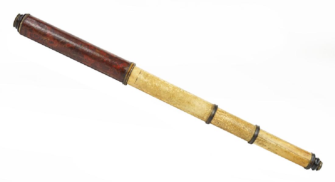 A Telescope.: A Telescope. Leather and vellum collapsable telescope, possibly Italian Length collapsed: 12.5"